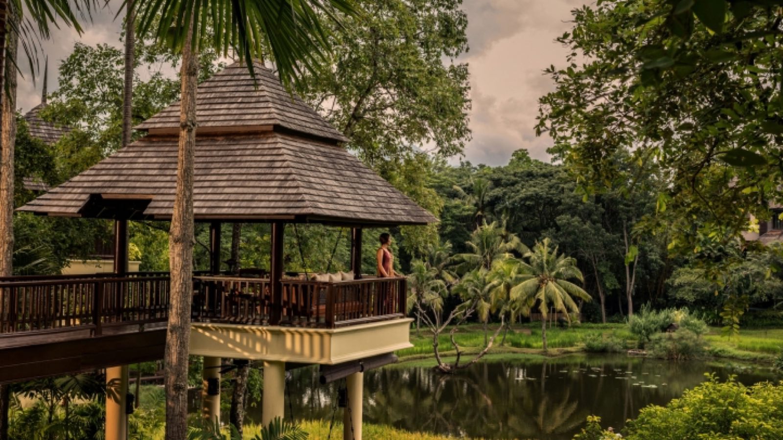 Four Seasons Resort Chiang Mai's teak pavilion on stilts over the lily pond