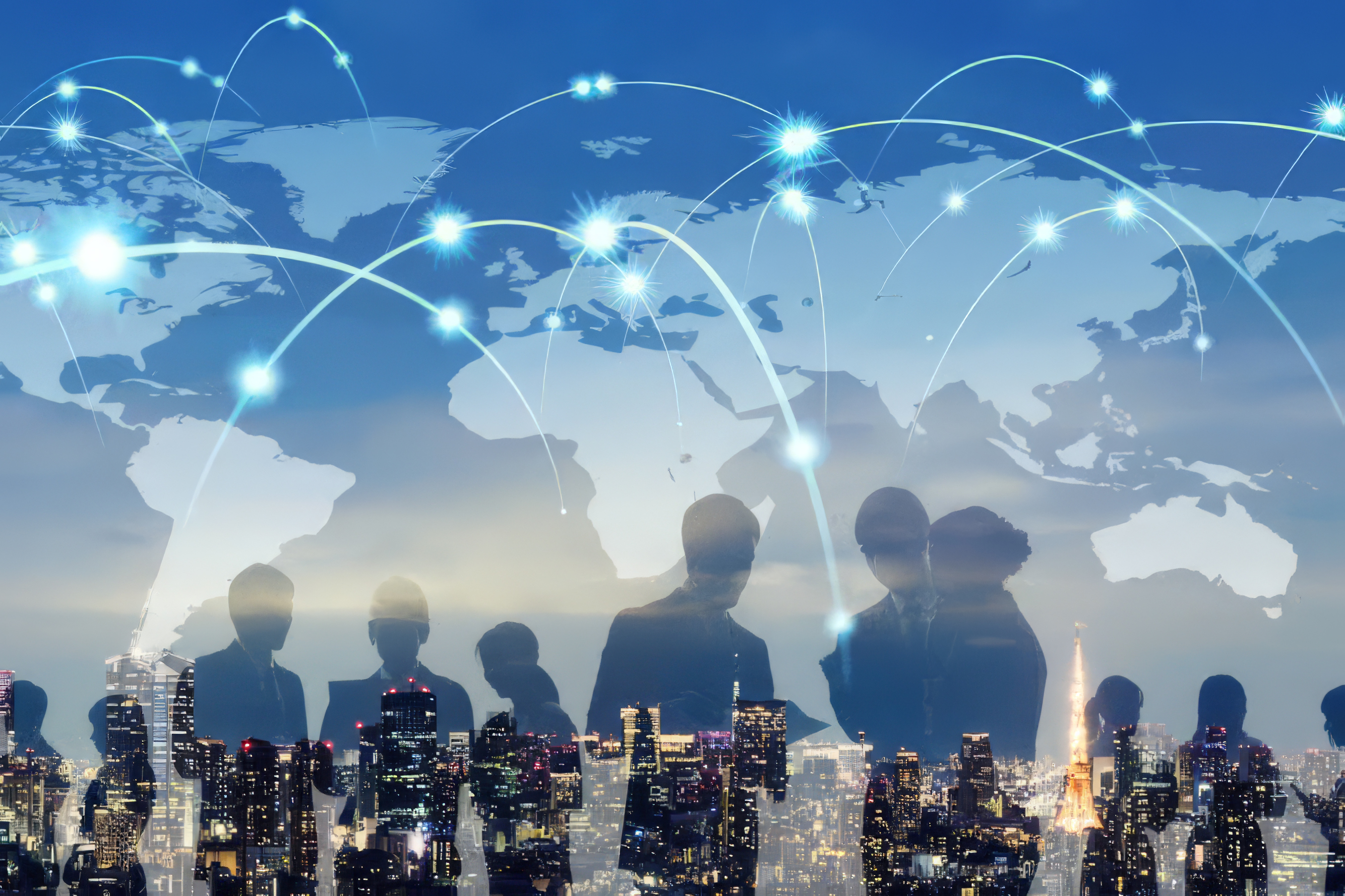 A composite image: a pale world map with glowing lines arcing between lit points across it, laid over a night-time city skyline, with the silhouettes of people in business dress in the foreground.