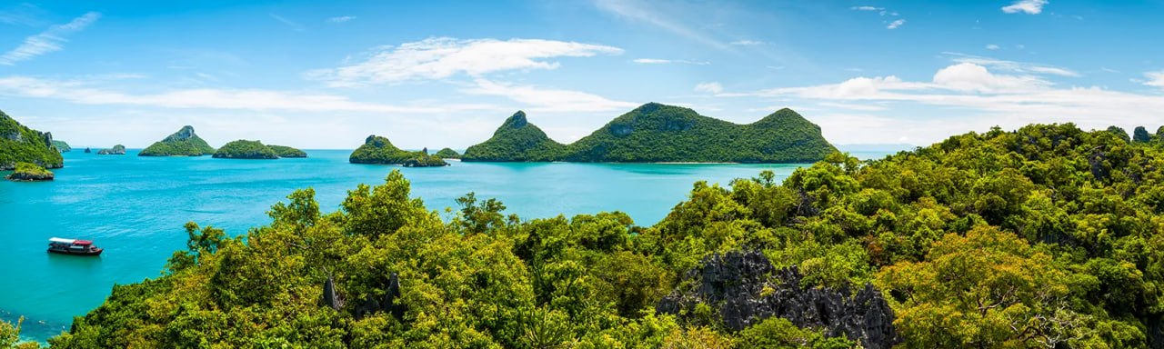 The limestone islands of Ang Thong marine park rising from turquoise water near Koh Samui