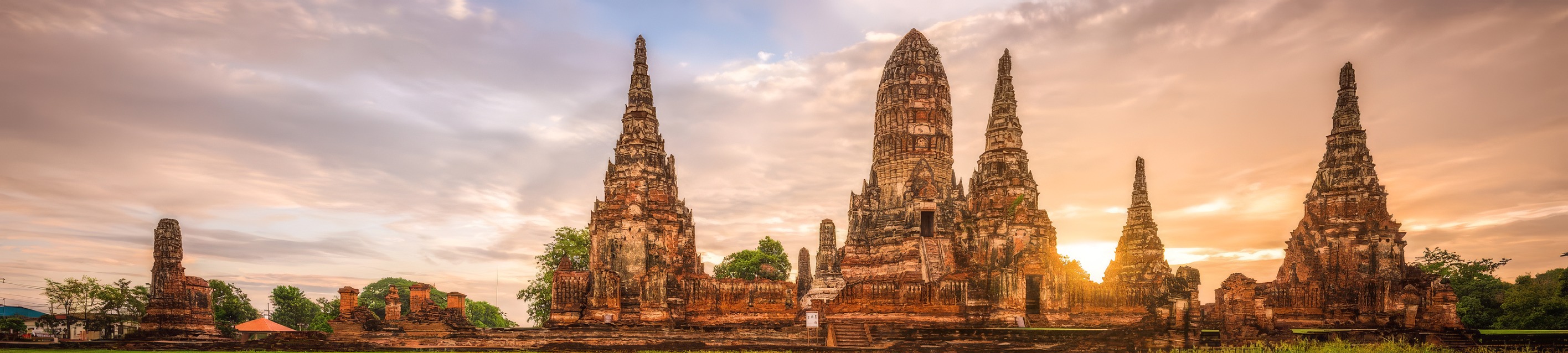 Wat Chaiwatthanaram's ruined prangs at golden hour, Ayutthaya