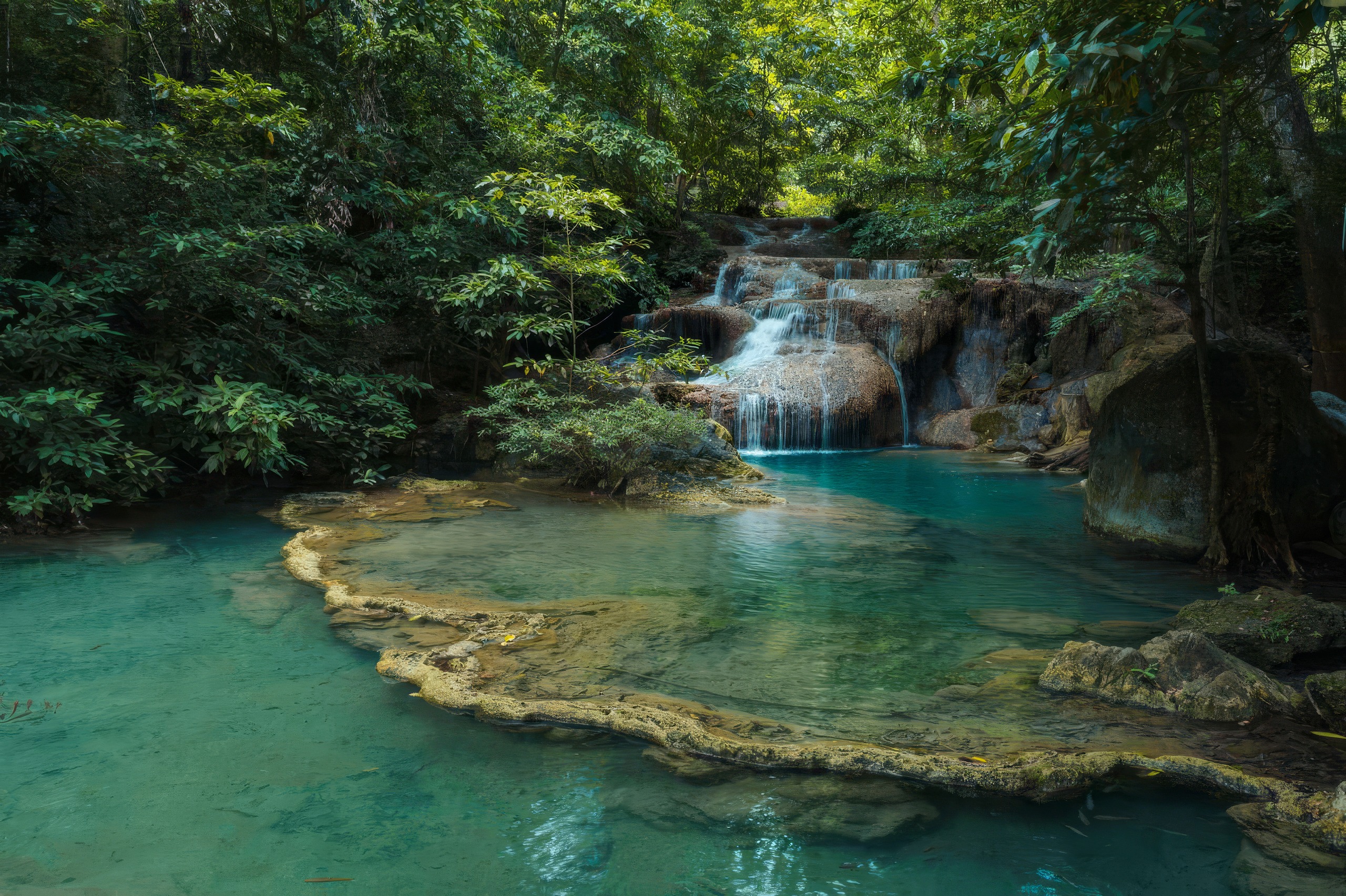 The tiered turquoise pools of Erawan Falls, Kanchanaburi
